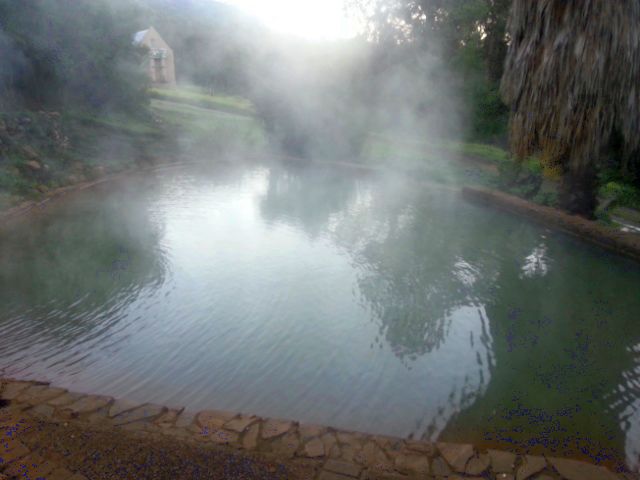 Secret hot pool with mist Caledon hot springs